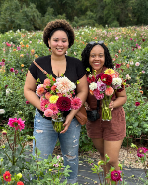 two women with their upick bouquets at Grateful Gardeners